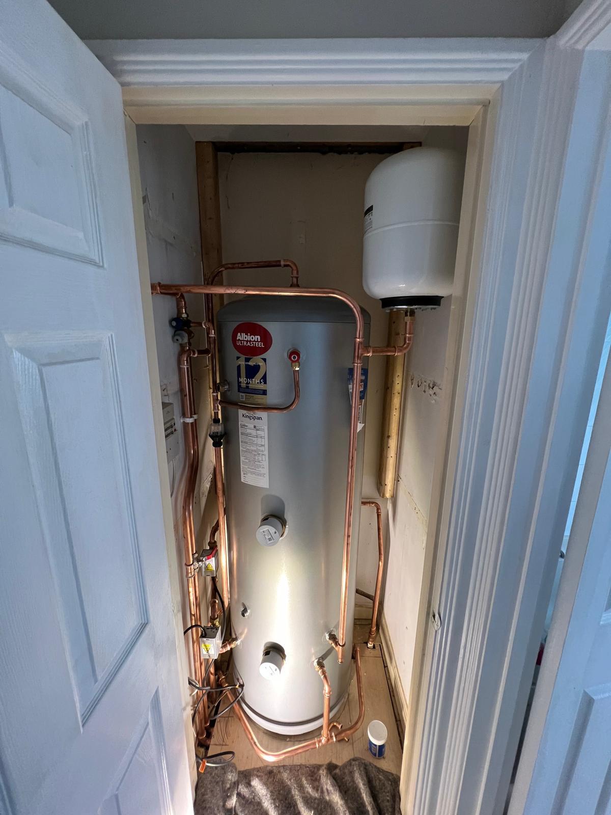 An unvented cylinder in an airing cupboard